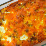 Loaded Breakfast Casserole has all the parts of your favorite breakfast wrapped into one decked out casserole---hash browns, eggs, cheese, sausage, bacon and ham.  This recipe serves a crowd making it perfect for your next holiday brunch.