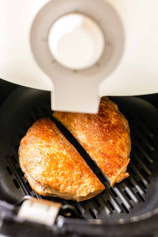 Golden brown berry hand pies in an Air Fryer.