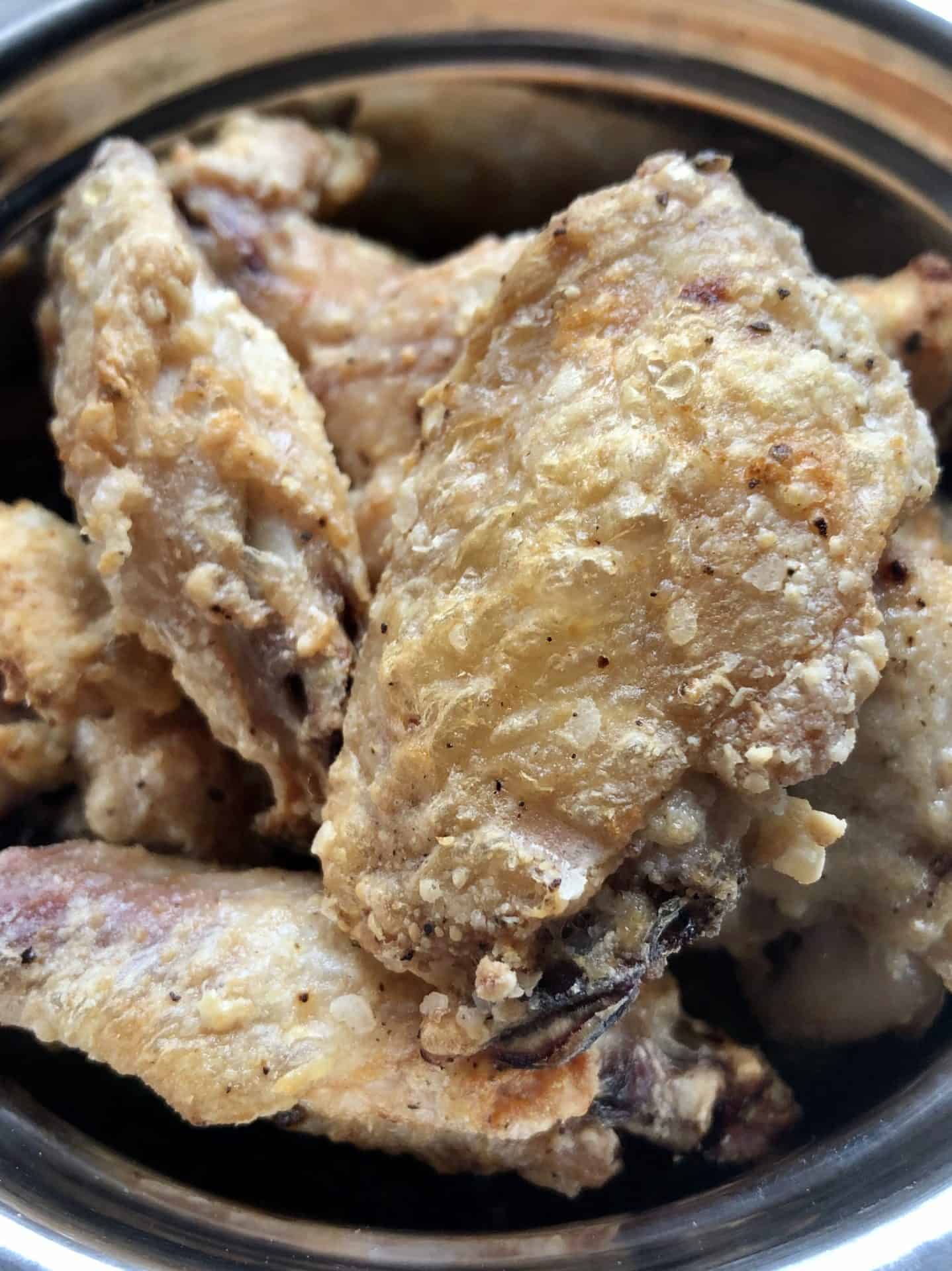 Close up view of air fried chicken wings before sauce