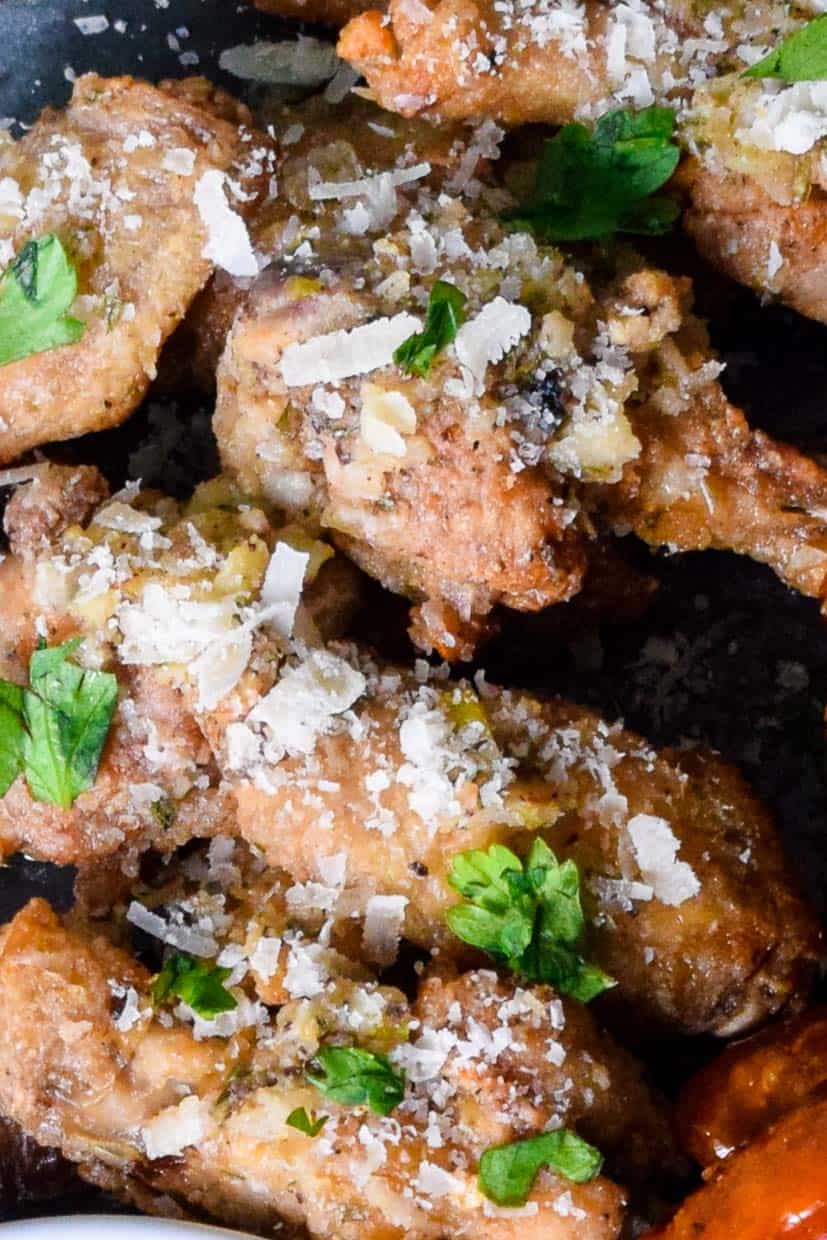 Close up view of air fried garlic parmesan wings 