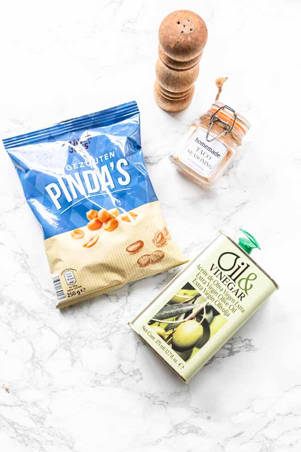 Ingredients for making roasted Air Fryer peanuts.