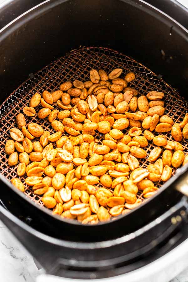 Peanuts roasted in an Air Fryer. Easy to make in no time and you can season them with your favorite flavor or just salt.