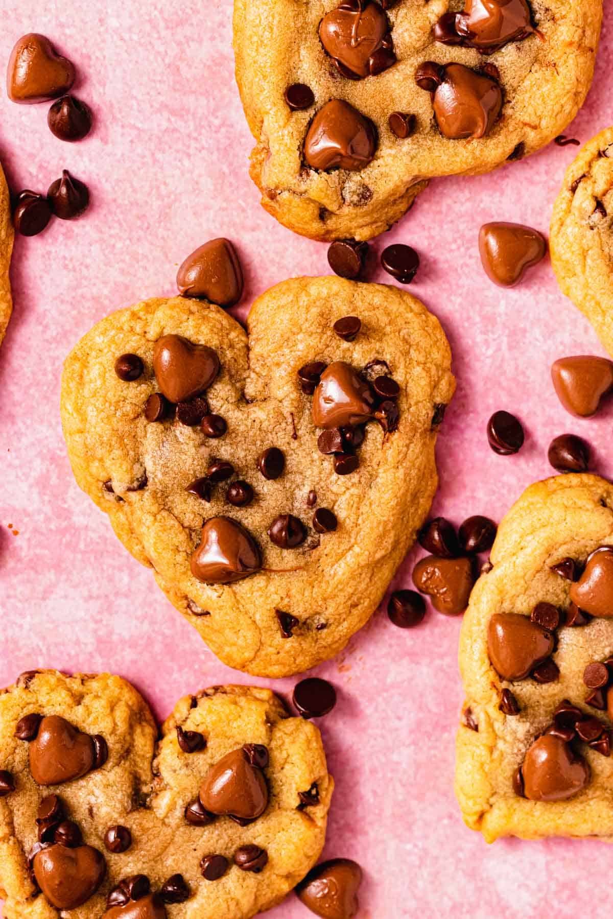 chocolate chip cookie hearts on pink table