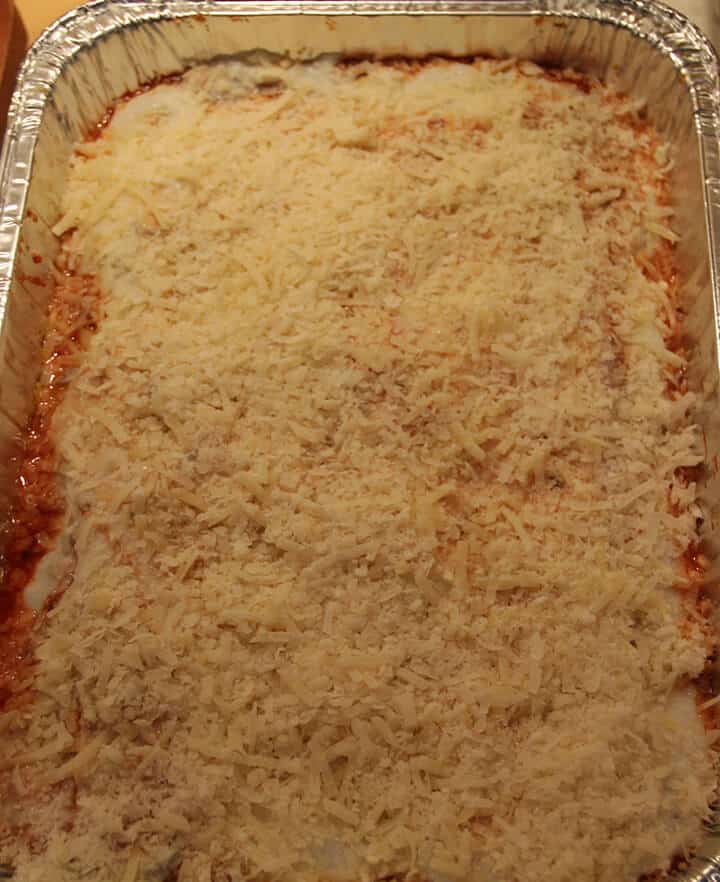Cheese and bechamel sauce covering pasta for lasagna without ricotta.