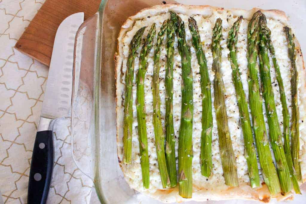 asparagus and ricotta tart ready for slicing