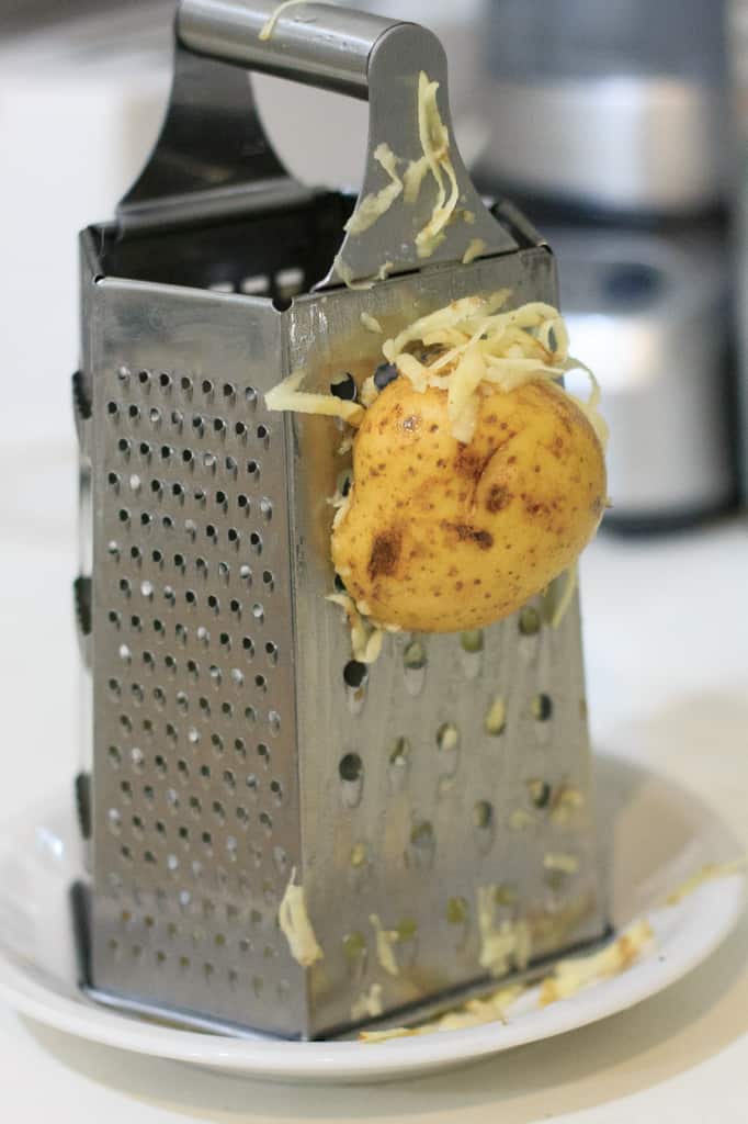 Potato latke topped with egg, kale, tomatoes and Tamari almonds