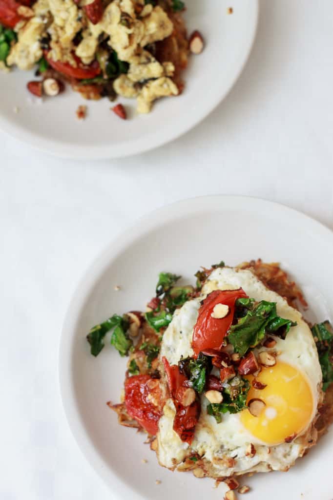 Potato latke topped with egg, kale, tomatoes and Tamari almonds