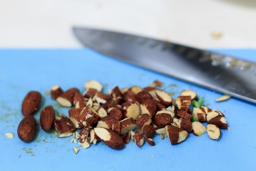 Potato latke topped with egg, kale, tomatoes and Tamari almonds