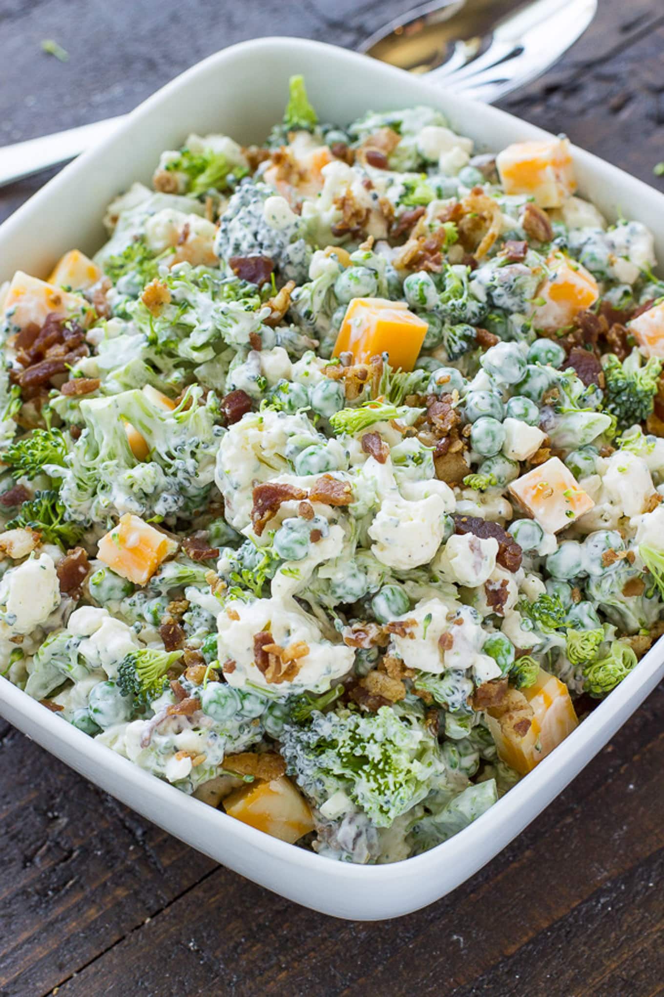 Broccoli salad assembled and in a serving bowl.