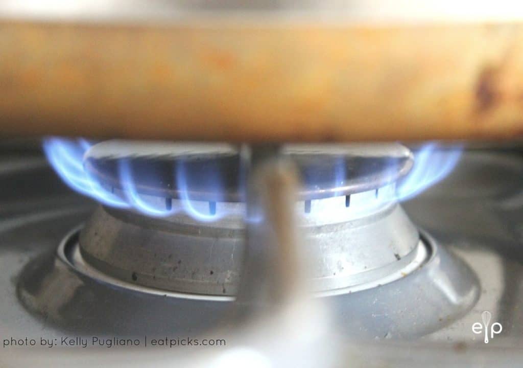 stockpot on burner cooking soup