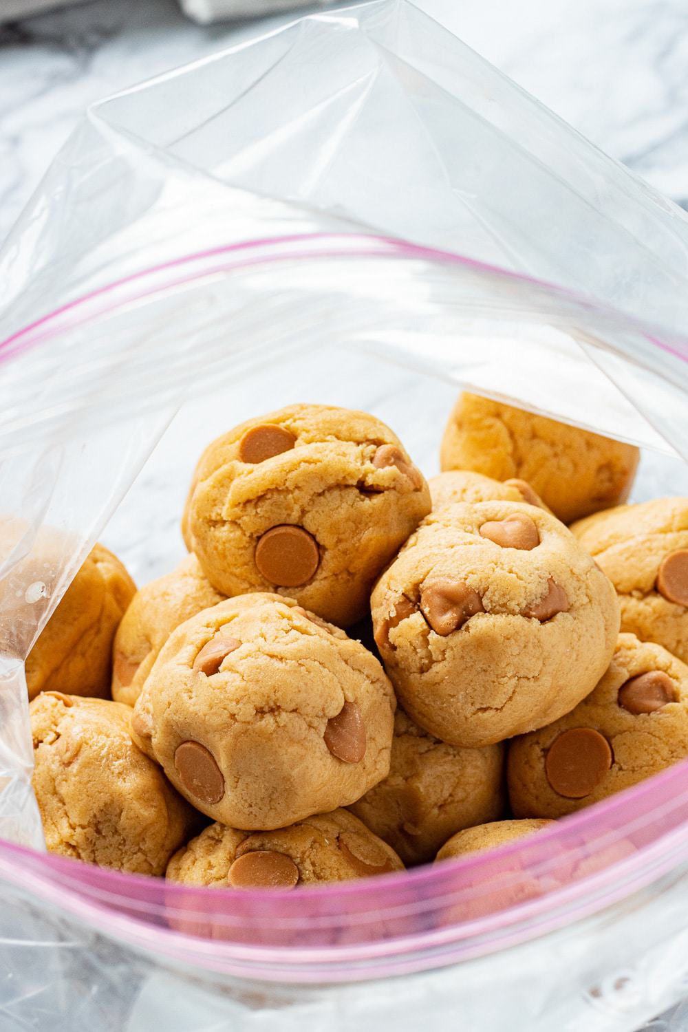 ziploc bag with butterscotch cookie dough balls inside 
