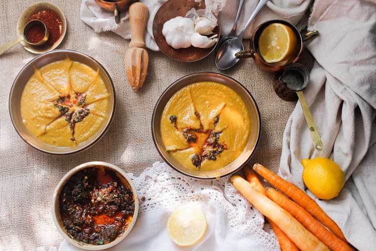 This deep and richly flavoured Moroccan carrot soup with slightly spicy chermoula is a revelation due to the pairing of garlic, cilantro and sweet, earthy carrots.