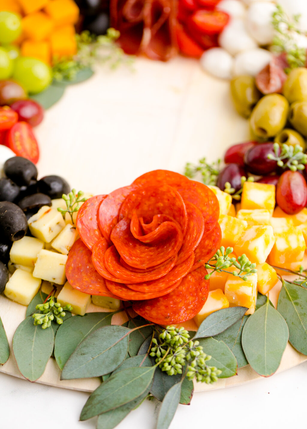 christmas wreath charcuterie board on table