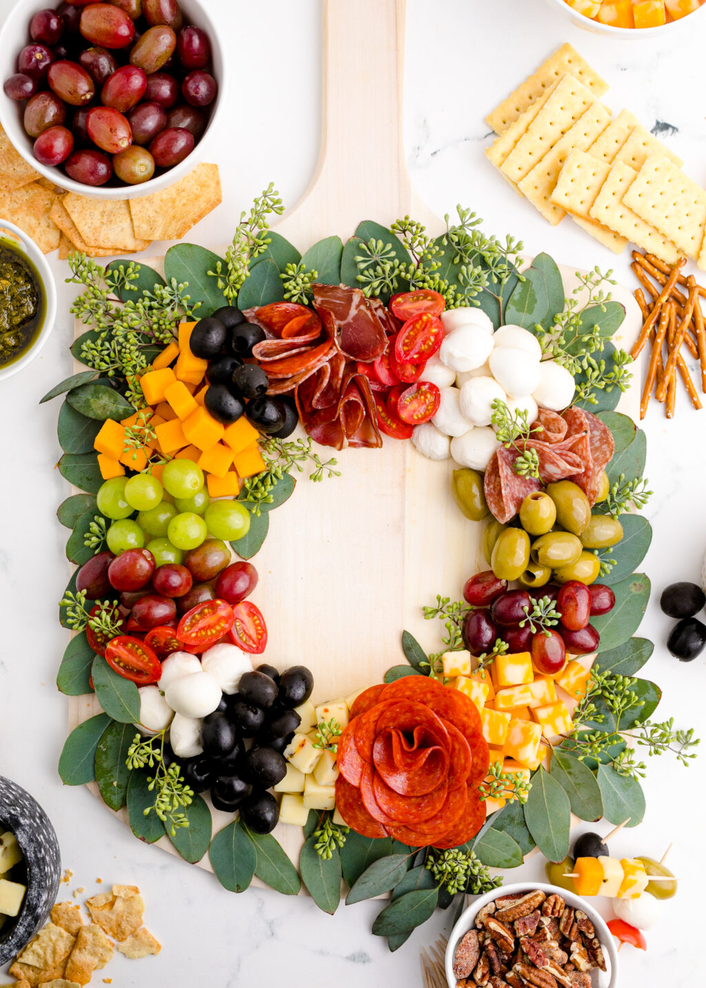 christmas charcuterie wreath board on marble table