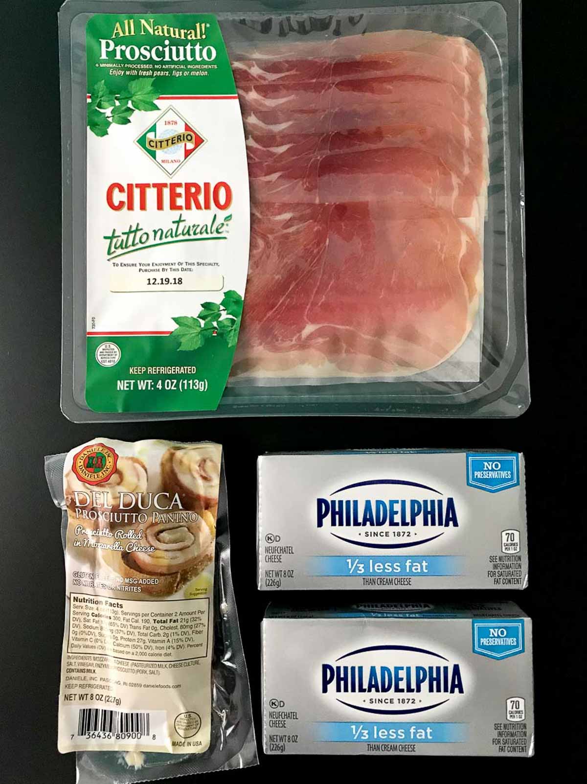 Ingredients for creepy Halloween hand on black background overhead shot