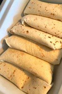 Crock Pot Ground Beef Enchiladas are a great recipe for your casserole crock pot.  With only six ingredients, ground beef enchiladas without enchilada sauce are quick to put together in a casserole slow cooker and can satisfy the family's need for Mexican food.