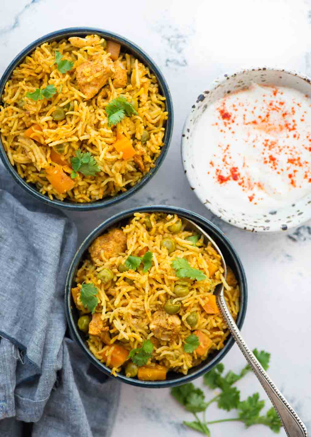 Instant Pot Chicken and rice, curried chicken and rice made in the Instant Pot is flavoured with garlic, ginger and curry powder. Fluffy basmati rice, chicken, carrot, peas, this wholesome meal is definitely going to impress you.