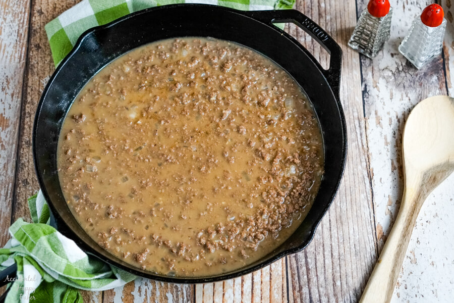 Shepherd's Pie with Tater Tots starts with ground beef in a gravy sauce. 
