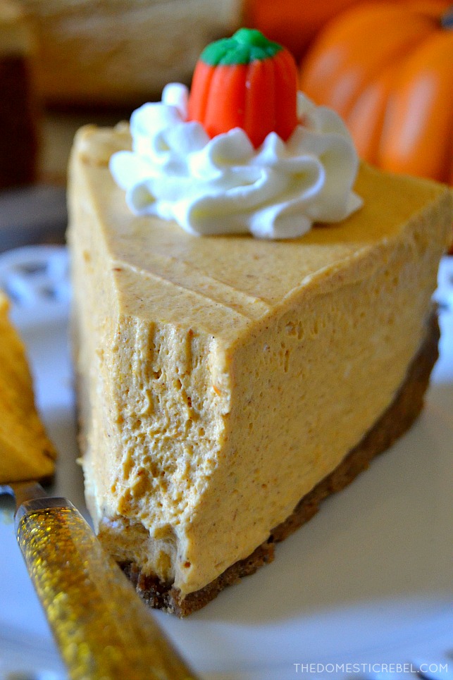 Closeup of a slice of pumpkin no-bake cheesecake with bite missing
