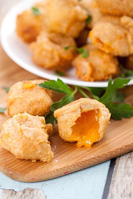 Deep Fried Cheese Bites recipe - Crispy, cheesy Deep Fried Cheese Bites in a flavorful beer batter make a perfect snack, appetizer, or even a side to your favorite burger. A cheese lover's dream! Love this for an easy appetizer recipe. 
