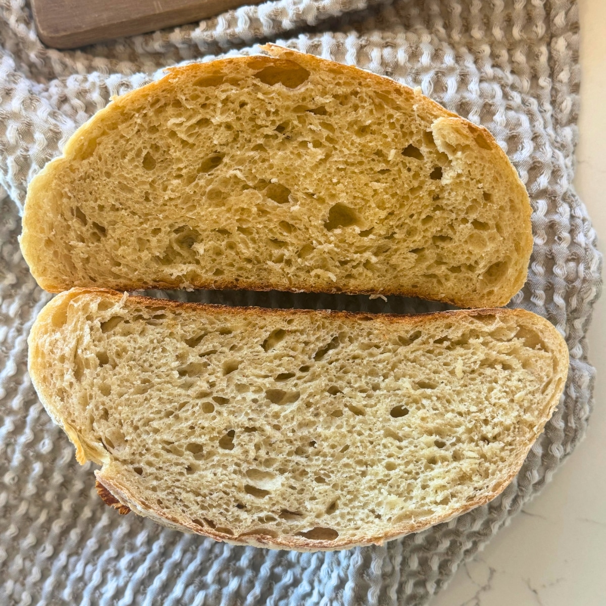 Dutch oven sourdough bread sliced open to show crumb