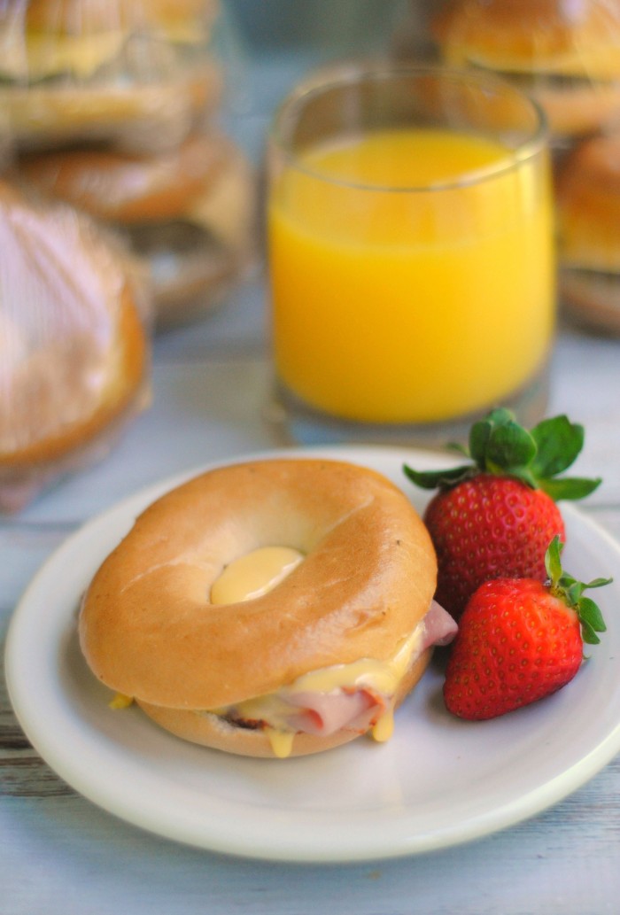 Need a homemade breakfast idea that you can make ahead and grab and go? This Easy Bagel Sandwich recipe is made with delicious toppings and can be frozen for on-the-go snacks or meals anytime!