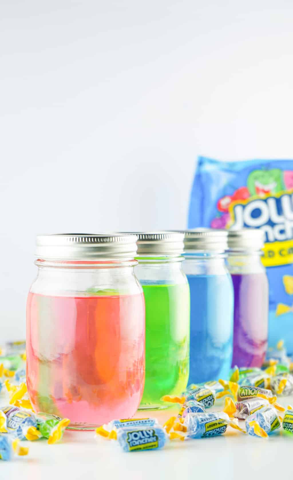mason jars filled with jolly rancher vodka