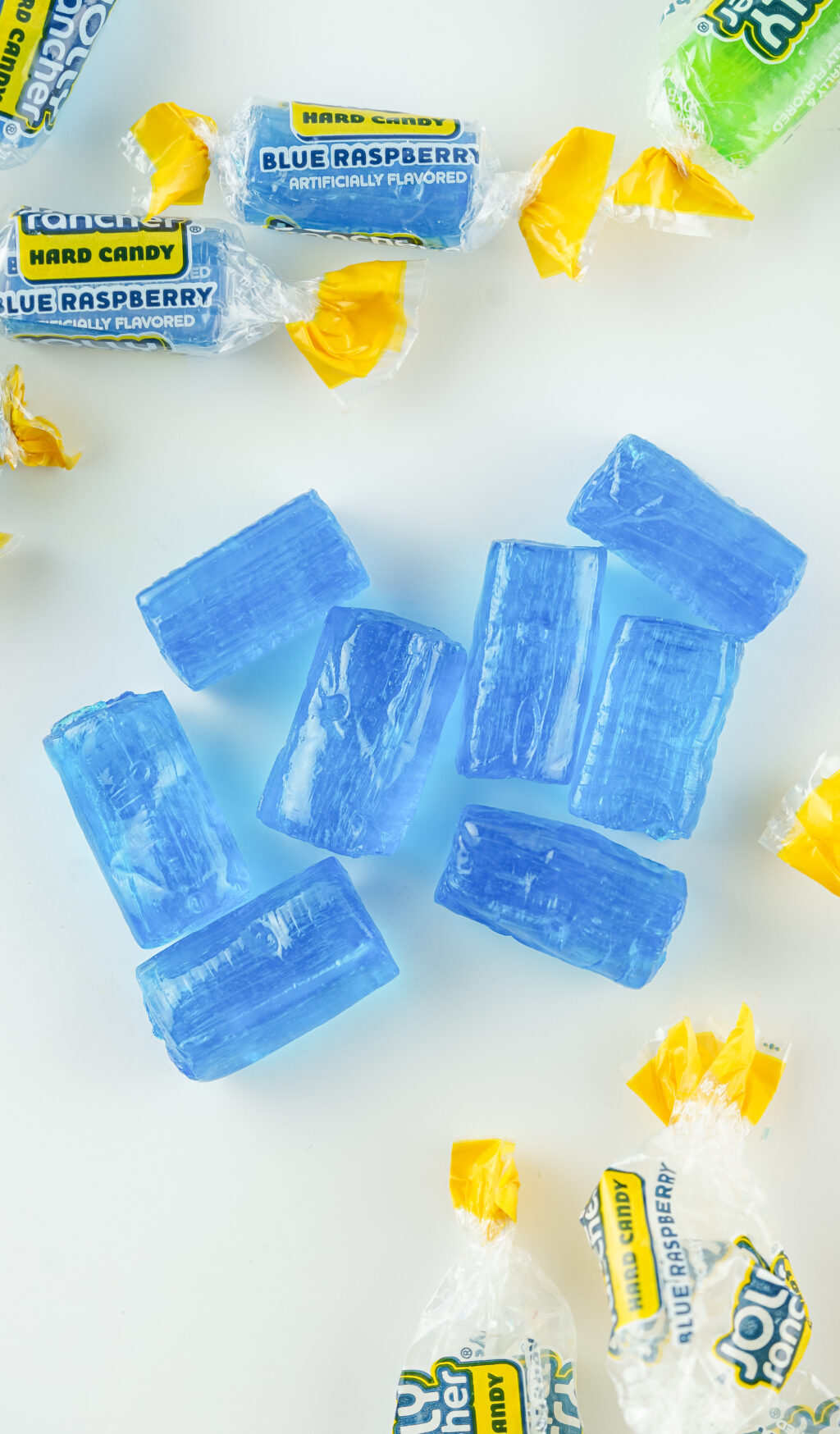 blue jolly rancher candies unwrapped on table