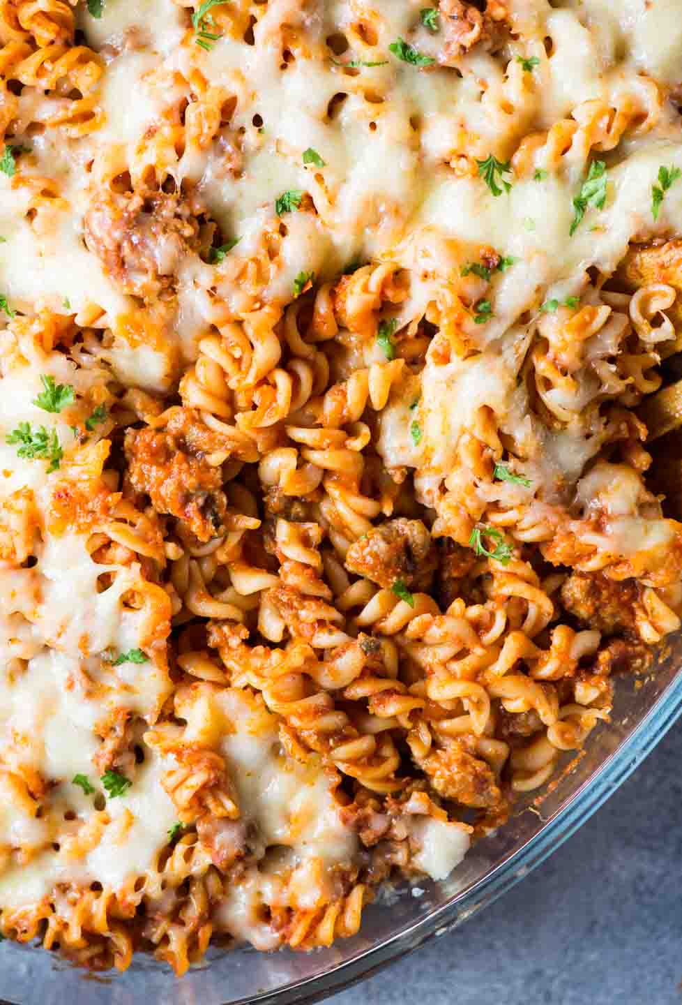 Our favourite Pasta Bake - tangy tomato sauce, spicy Italian Sausage and lots of cheese together makes this baked pasta dish delicious and super satisfying. 