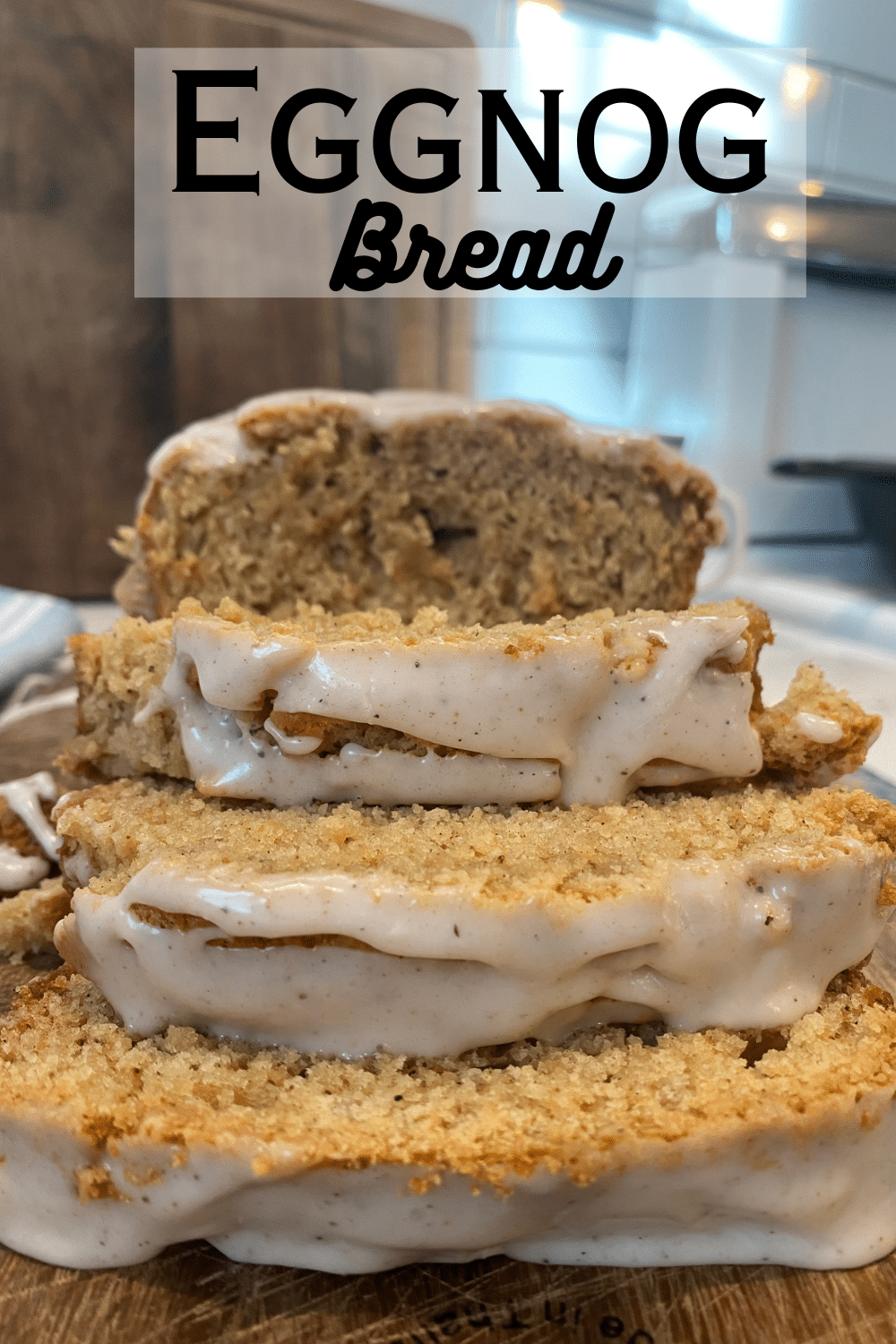 eggnog bread with glaze sliced with text