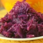 Don't wait until Oktoberfest to make this German-Style Red Cabbage. Braised in a skillet with green apples and a hint of cloves, this recipe is a hit with all ages. 