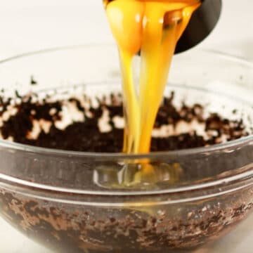 Eggs being added to mixture.