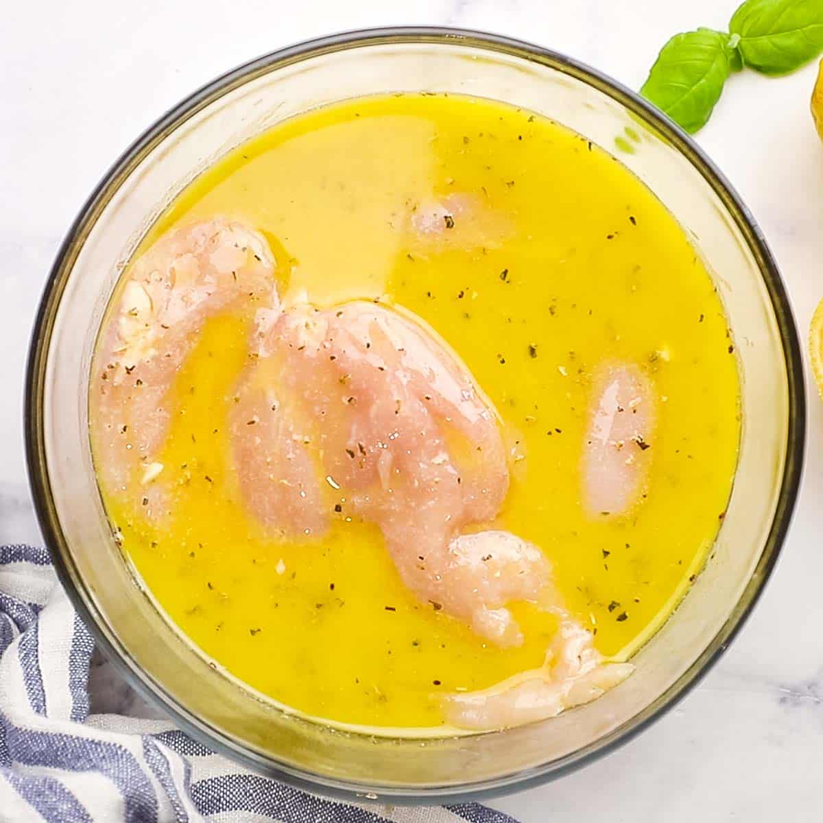 chicken breast in the marinade bowl