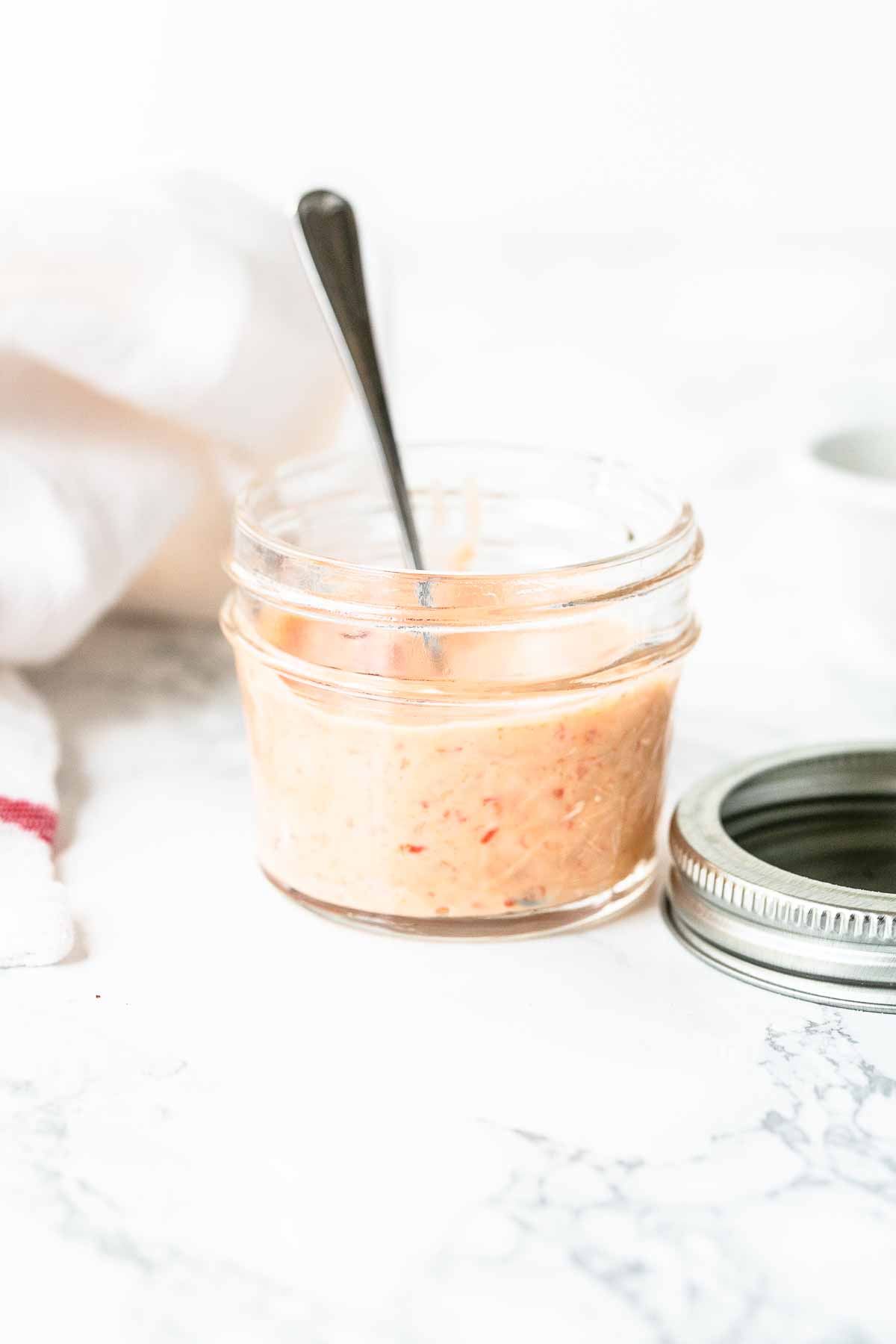 Want to make the best burger sauce? Try this recipe. It is super easy and contains only 3 ingredients. Put it on your favorite burger, you will love it! It is slightly spicy but you can control how hot you can make it. This sauce is made with mayonnaise but can easily be adjusted to a lower-calorie sauce.