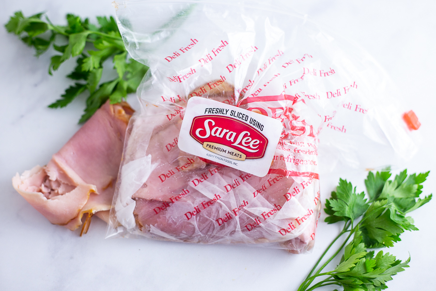 This Flatbread Hawaiian Pizza is quick, easy, and totally delicious! An addicting tangy, salty sweet combination with ham, pineapple, cheese, and a little bacon for good measure. 