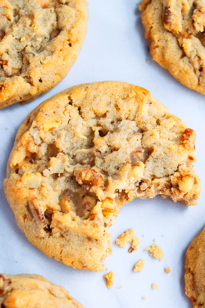 Soft and Chewy Pecan Cookies with Bite Removed