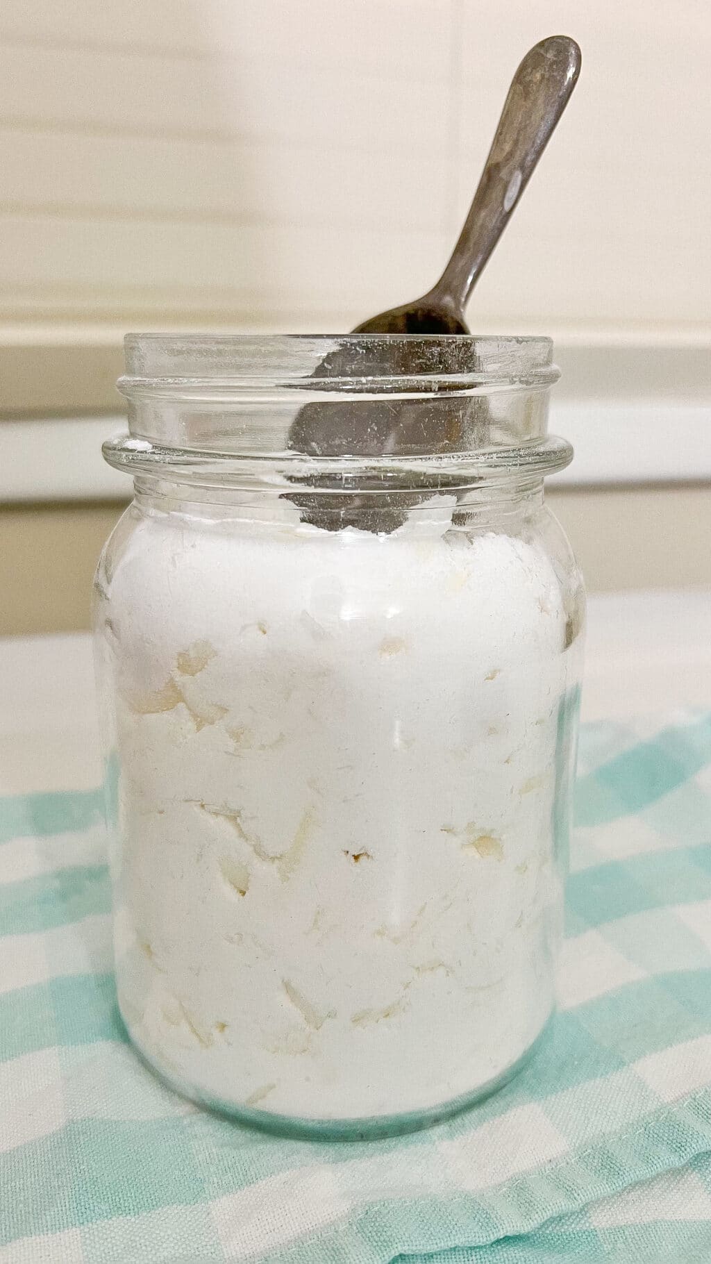 jar of homemade laundry detergent on table