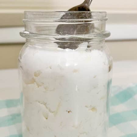 jar of homemade laundry detergent on table