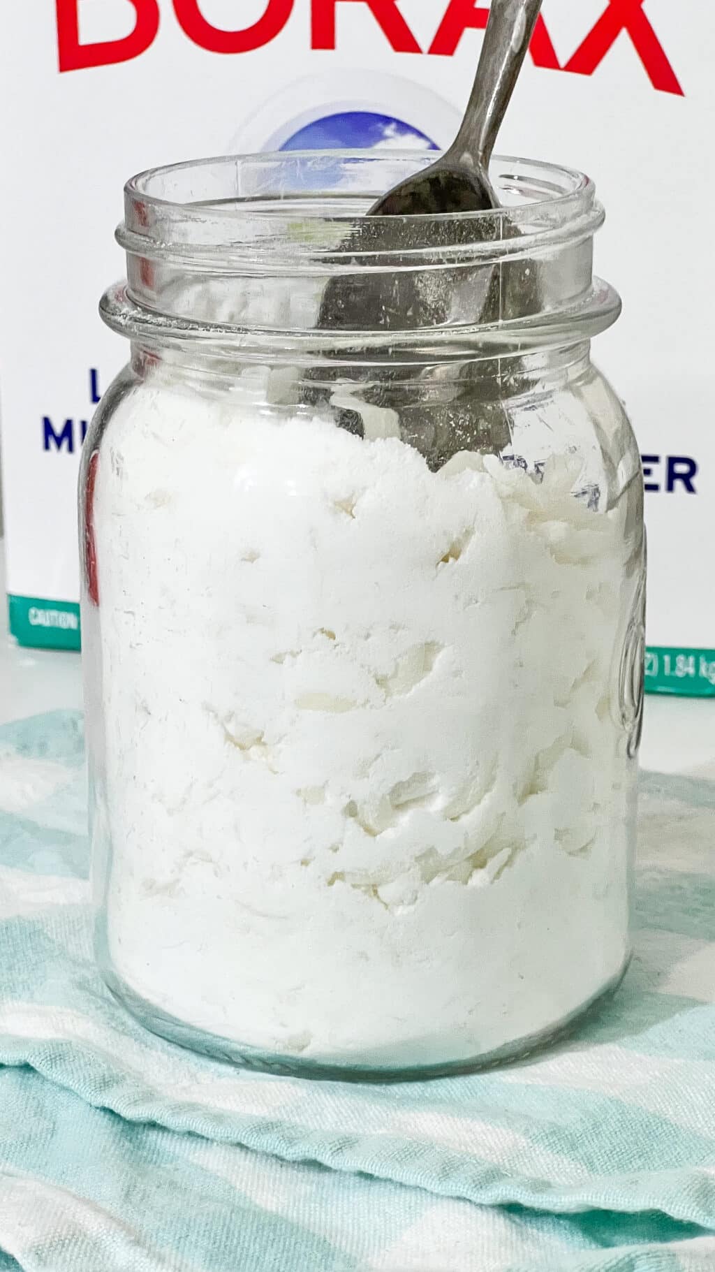 side view of jar of homemade laundry detergent