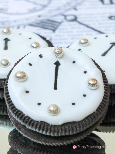New Year Oreo Clock Cookies, cute New Year's eve cookies, easy best New Year's eve party food dessert ideas recipes, Oreo Cookie clocks no bake easy to make cookies for New Year's Eve party, cute cookie ideas for kids New Year's eve only 3 ingredients