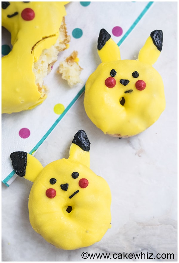 Mini Pikachu Donuts on White Marble Background. 
