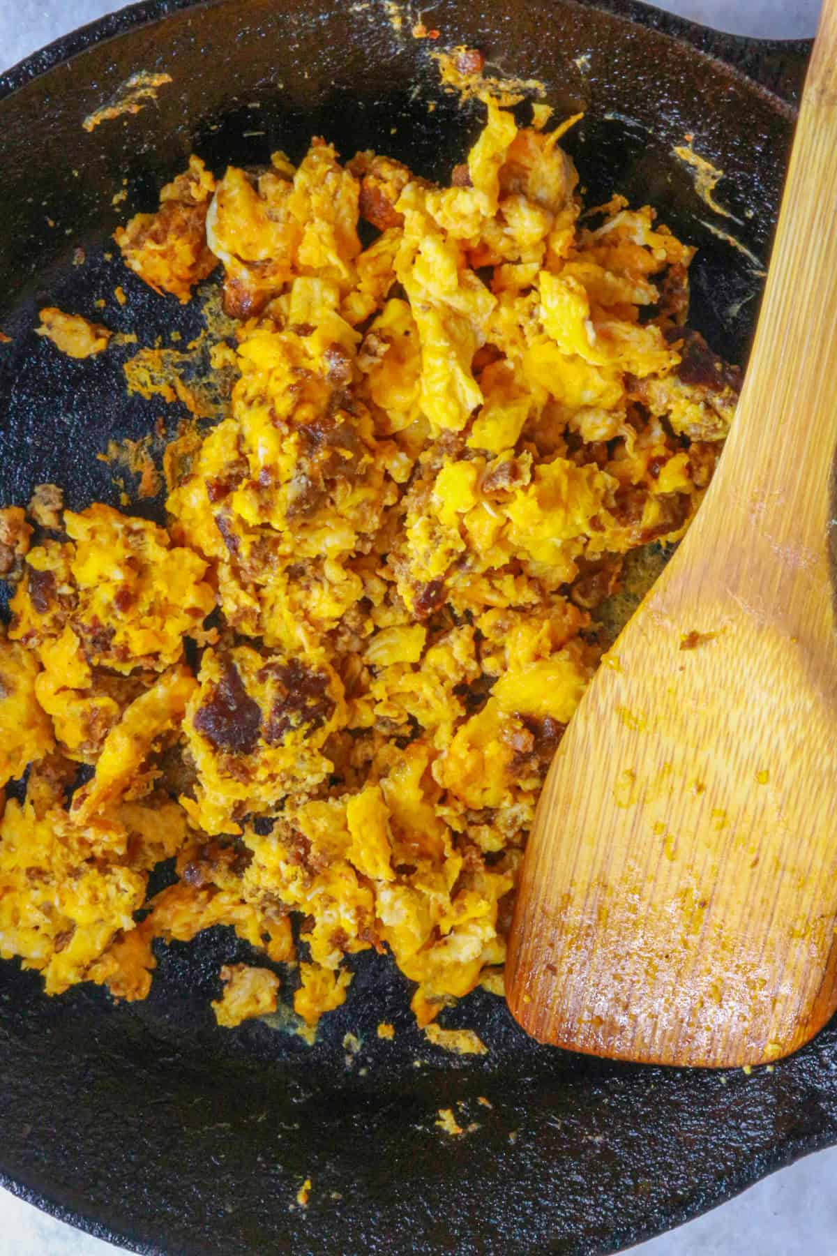 scrambled eggs with chorizo in a skillet