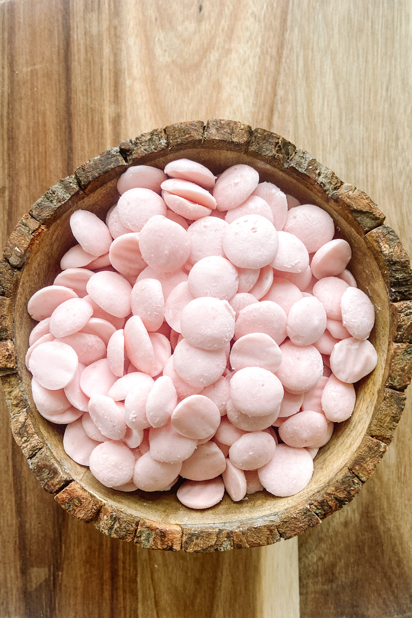 Strawberry banana yogurt melts in a wooden bowl