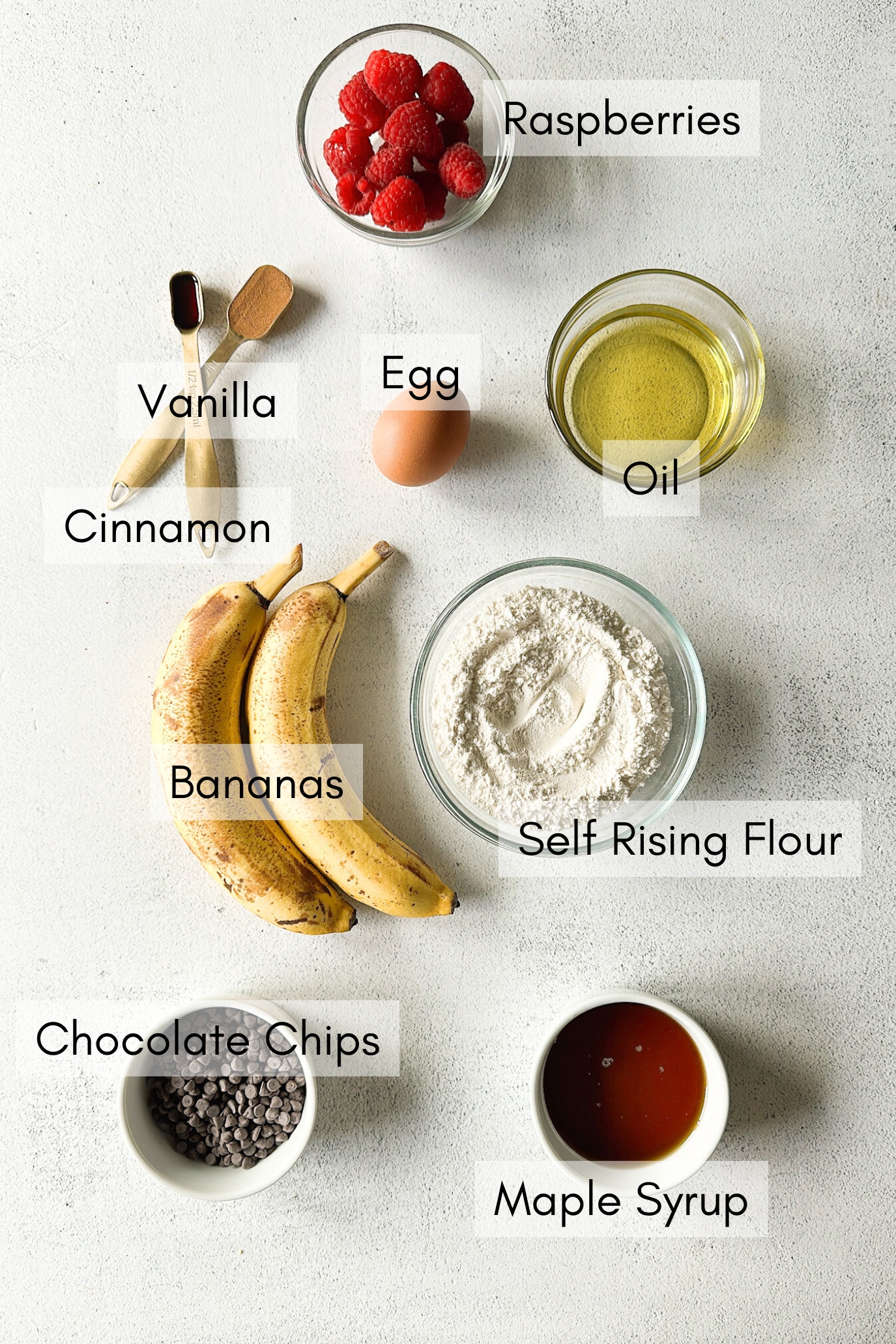 Ingredients to make raspberry banana muffins.