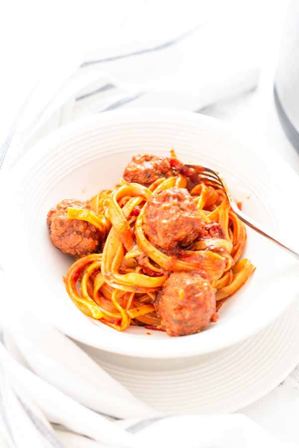 Instant Pot pasta and meatballs is a super easy and delicious dinner recipe. You can add your pasta to readymade meatballs and sauce or make it from scratch.