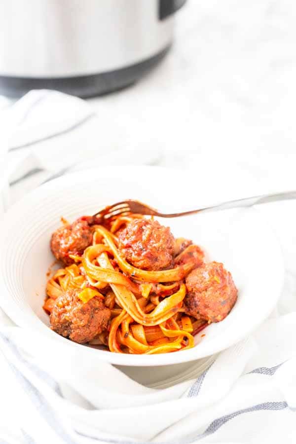 Instant Pot pasta and meatballs is a super easy and delicious dinner recipe. You can add your pasta to readymade meatballs and sauce or make it from scratch.