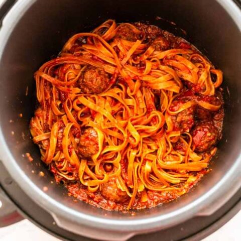 Instant Pot pasta and meatballs is a super easy and delicious dinner recipe. You can add your pasta to ready made meatballs and sauce or make it from scratch. Want to try? Visit fastfoodbistro.com for the full recipe and instructions