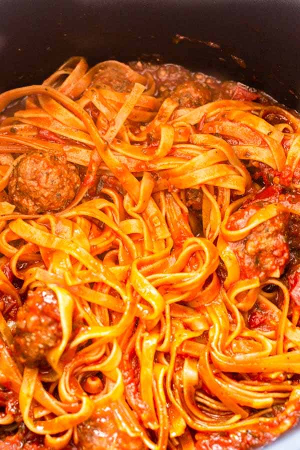 Instant Pot pasta and meatballs is a super easy and delicious dinner recipe. You can add your pasta to readymade meatballs and sauce or make it from scratch.