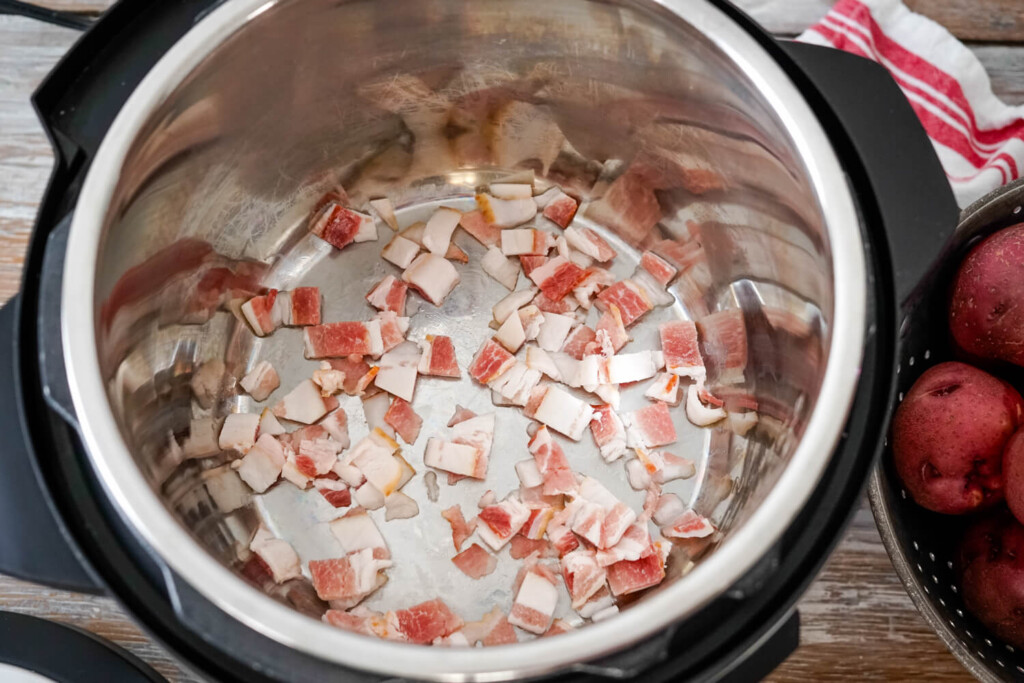 Frying the bacon in the instant pot.