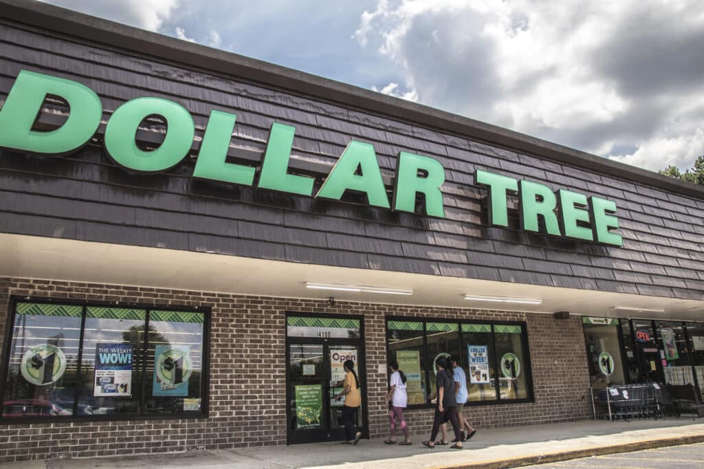 front of dollar tree store with people walking in